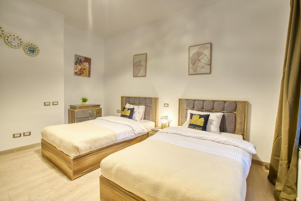 The Suites Near Auc By Elegant Cairo Exterior foto